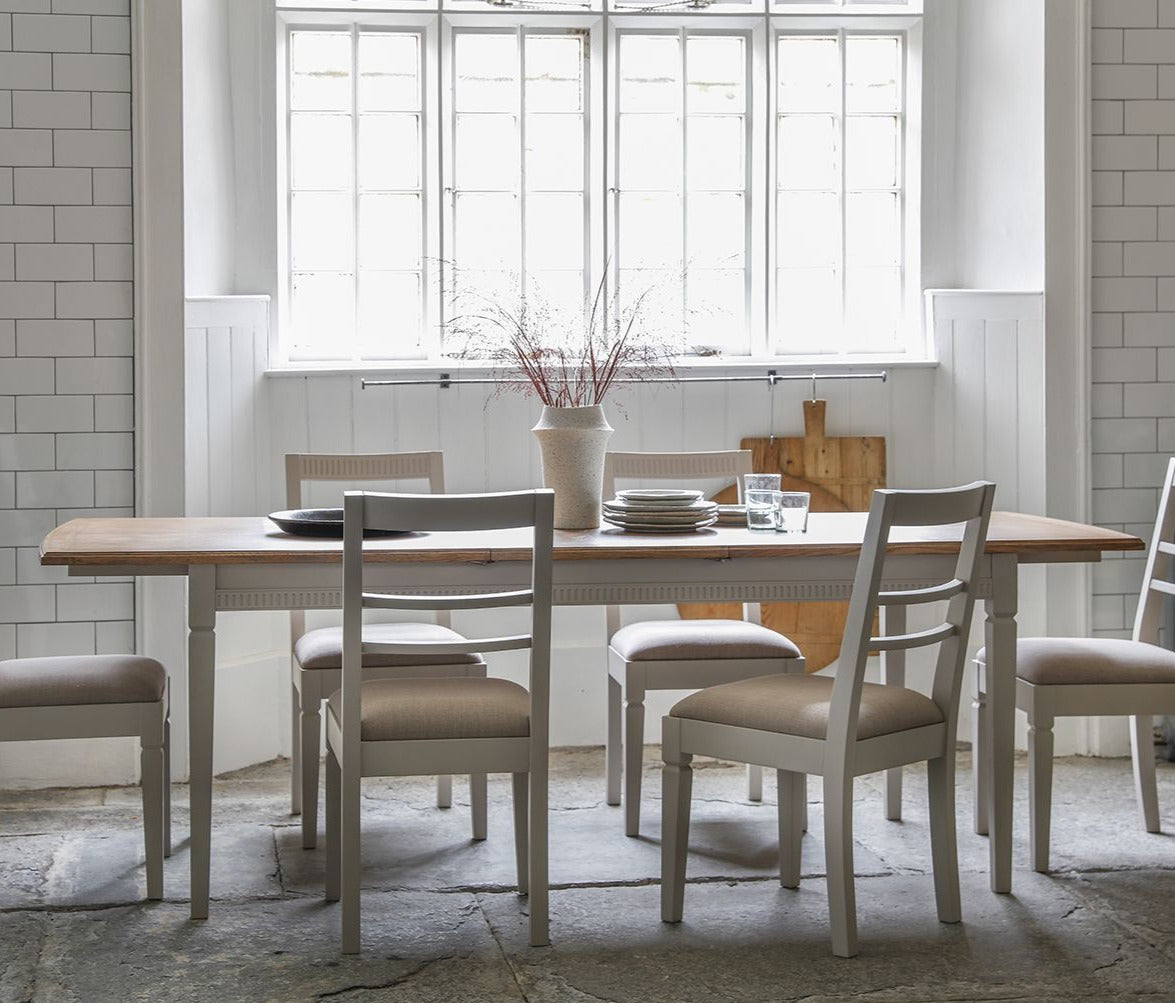 Rectangular dining table with six chairs.