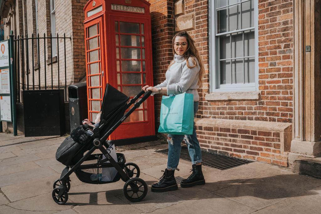 Black baby stroller.