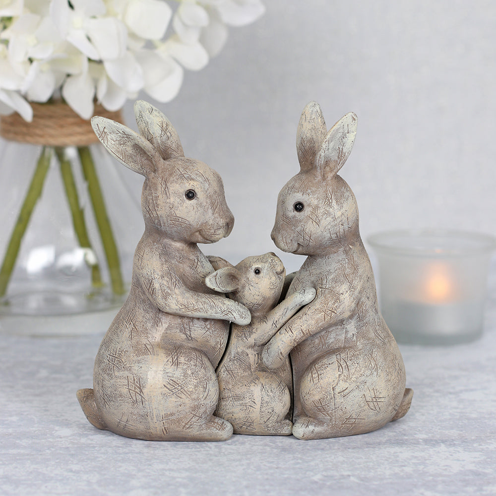 Gray bunny family figurine.