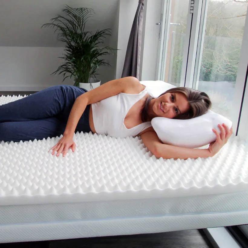 White egg crate mattress topper.