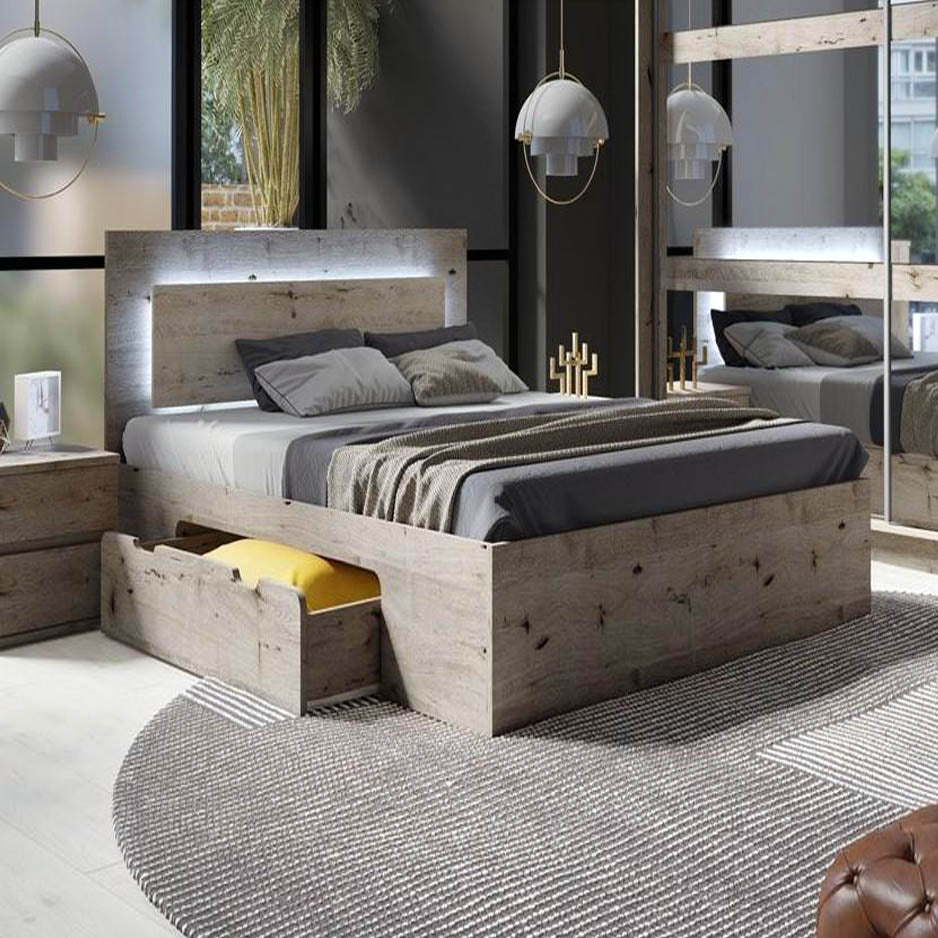 Wooden bed with storage drawer.